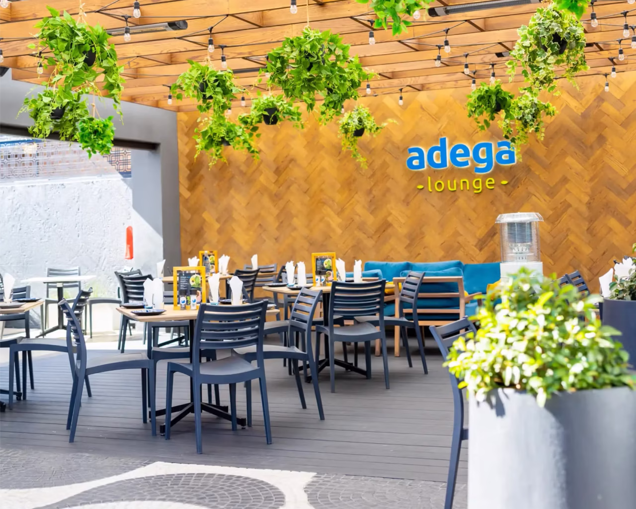 Elegant outdoor dining area of Adega Lounge in Norwood, a partner restaurant of Teamoting for affordable team building activities in Johannesburg.