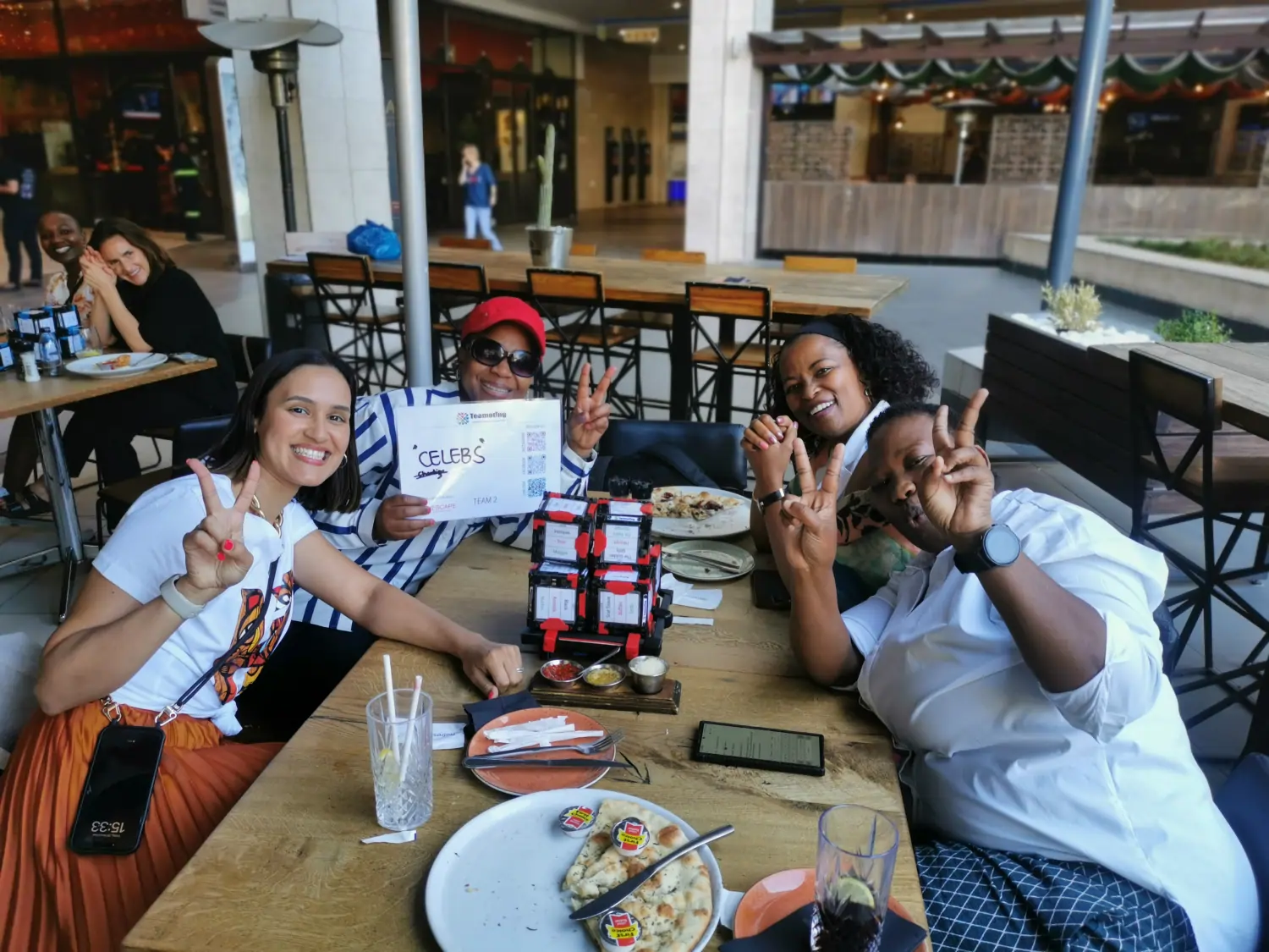 The HCRISA team, calling themselves the "CELEBS", smiling for a photo during a team building event at Salsa Mexican Grill, Bedford Centre