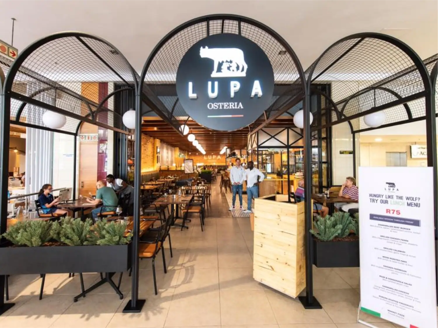 Lupa Osteria restaurant entrance at Bedford Centre, a venue for team building with Teamoting